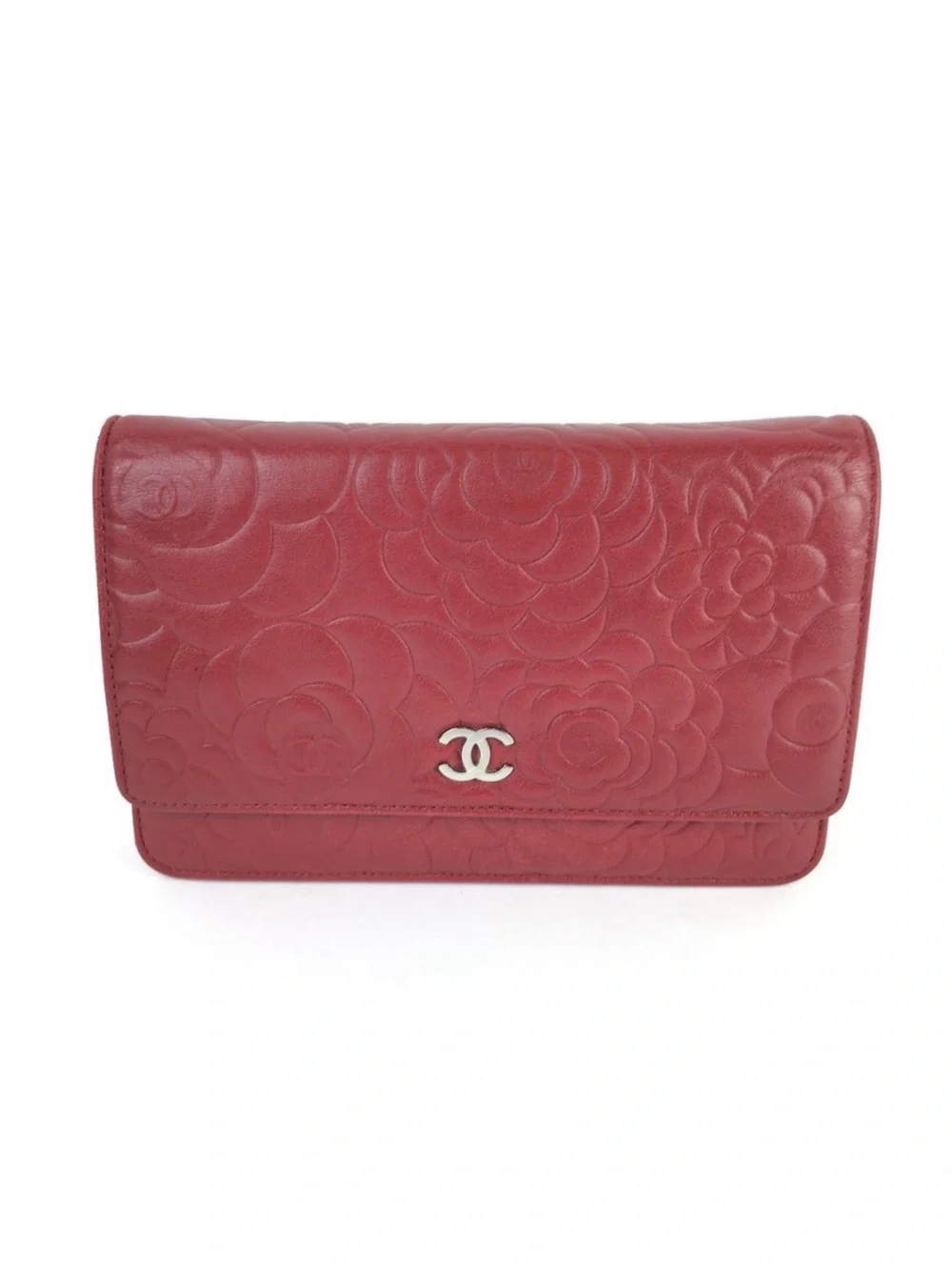 CHANEL Camellia-Embossed Leather Clutch in Deep Red with Silver CC